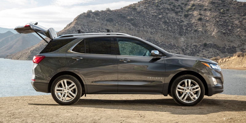 side view of a 2019 Chevrolet Equinox with trunk lifted