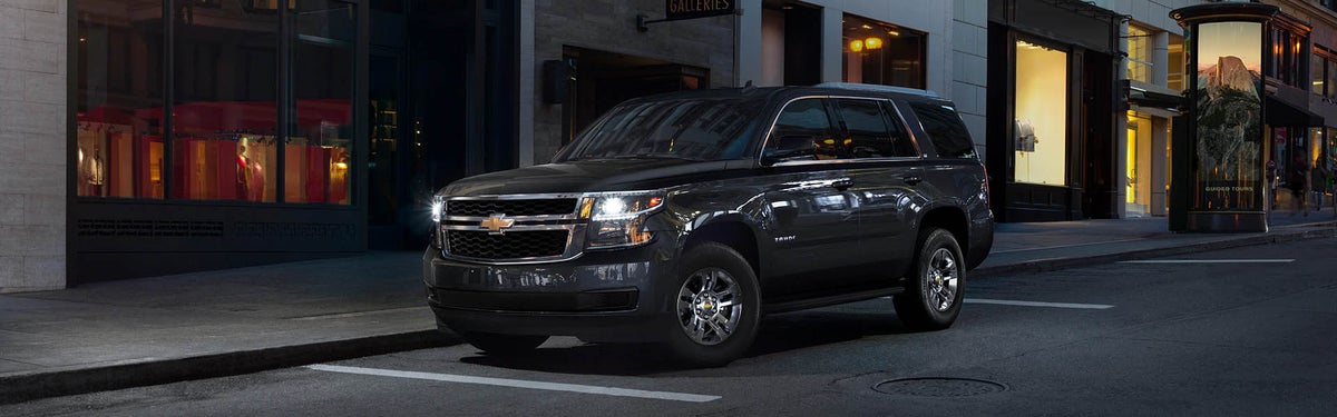 Front side view of a Chevrolet Tahoe parked on the side of the street