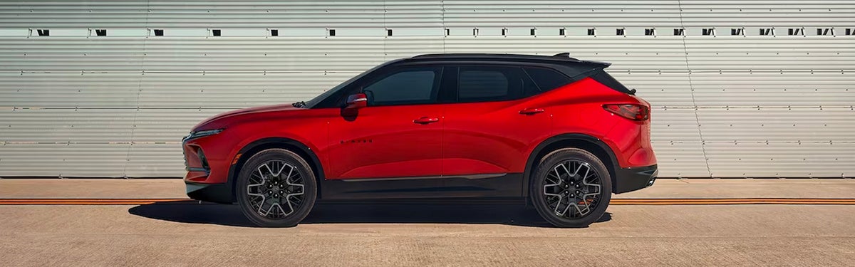 Side view of a red 2024 Chevrolet Blazer vehicle