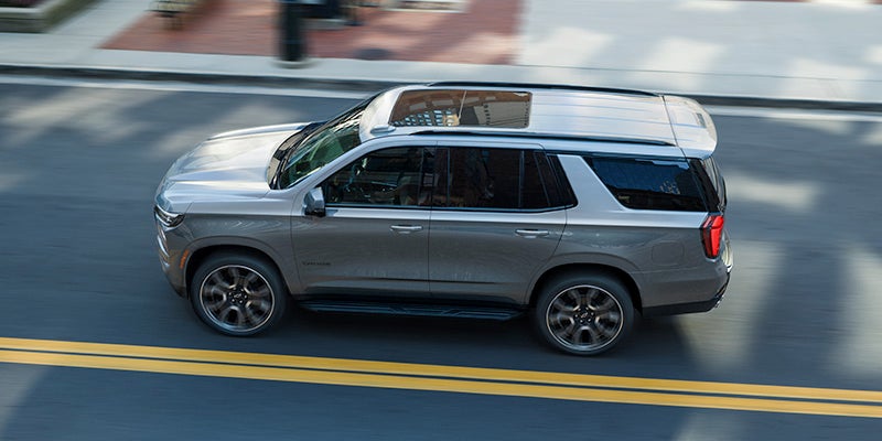 aerial view of a 2025 Chevrolet Tahoe driving on road