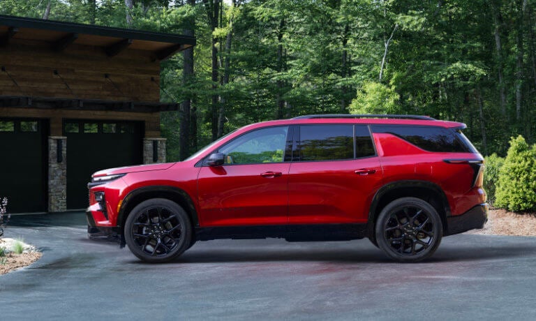 2026 Chevy Traverse Exterior In Forest Driveway